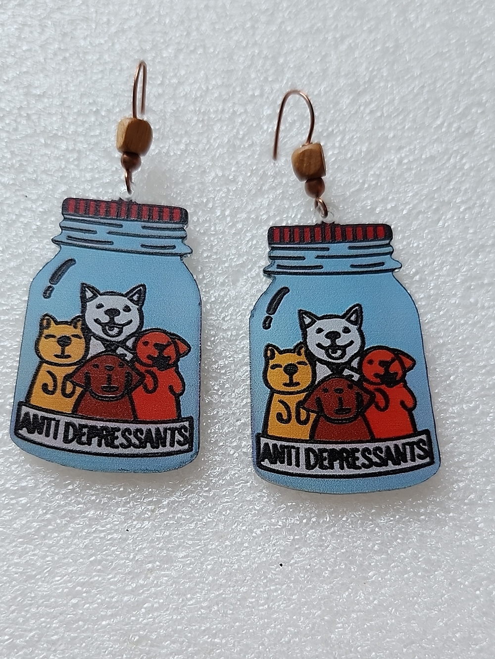 Hand Crafted Light Blue Jar Earrings with Red, Orange, Yellow Pets